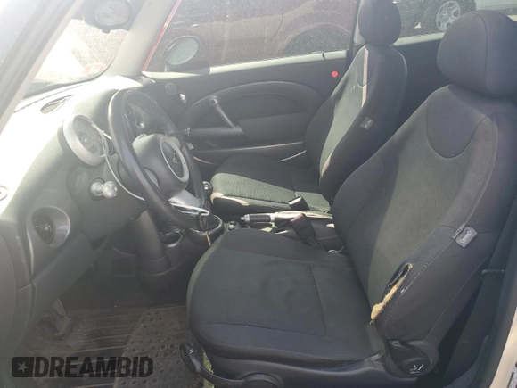 2005 MINI Hardtop with VIN WMWRC33585TK60334, listed as a Copart auction lot 65563635 with 122,758 mi miles and Clean title. Bid and sale history available at DreamBid. Image 7.