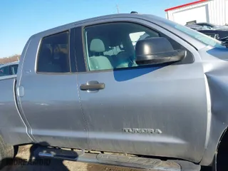 2012 Toyota Tundra 2WD Truck with VIN 5TFRM5F17CX049149, listed as a IAAI auction lot 41452717 with 186,338 mi miles. Bid and sale history available at carsss.com. Image 13.