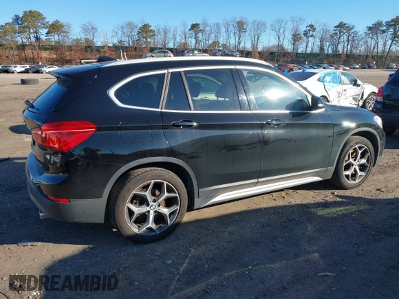 2018 BMW X1 xDrive28i with VIN WBXHT3C36J5L29746, listed as a IAAI auction lot 41547100 with 103,420 mi miles and . Bid and sale history available at DreamBid. Image 4.