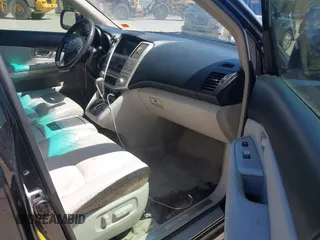 2006 Lexus RX 400h with VIN JTJHW31U760019722, listed as a IAAI auction lot 42117438 with 173,410 mi miles and . Bid and sale history available at DreamBid. Image 5.