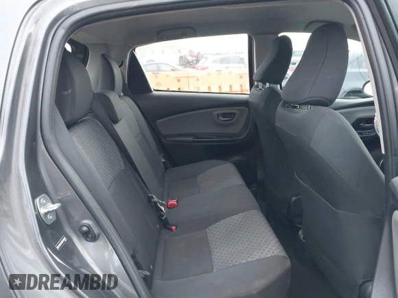 2015 Toyota Yaris L with VIN VNKKTUD38FA043393, listed as a IAAI auction lot 41573010 with 107,146 mi miles and . Bid and sale history available at DreamBid. Image 8.