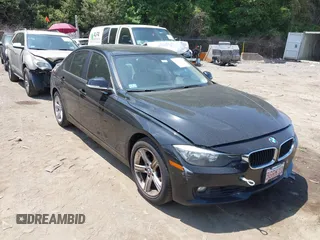 2015 BMW 3 Series 328i xDrive with VIN WBA3B5C52FP653910, listed as a IAAI auction lot 42563622 with 153,033 mi miles and . Bid and sale history available at DreamBid. Image 1.