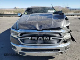 2020 Ram 1500 Laramie with VIN 1C6RREJT5LN139087, listed as a Copart auction lot 56407905 with 122,899 mi miles and Salvage title. Bid and sale history available at DreamBid. Image 5.
