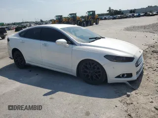 2014 Ford Fusion Titanium с VIN 3FA6P0D93ER205744, выставлен на аукционе Copart как лот 56228345 с пробегом 160 882 миль миль и Списание • Salvage title. История ставок и продаж доступна на DreamBid. Изображение 4.