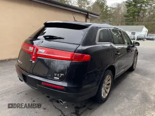 2016 Lincoln MKT with VIN 2LMHJ5NK0GBL00069, listed as a Copart auction lot 55393865 with 115,725 mi miles and Clean Title. Bid and sale history available at DreamBid. Image 4.
