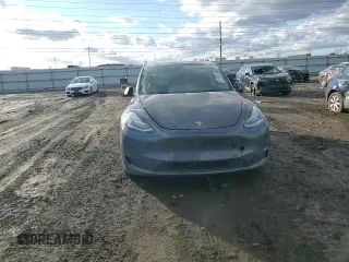 2022 Tesla Model Y Long Range with VIN 7SAYGDEE7NF386082, listed as a Copart auction lot 47191625 with 73,634 mi miles and Salvage Title. Bid and sale history available at carsss.com. Image 11.