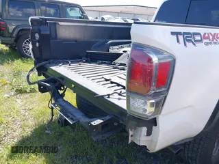 2021 Toyota Tacoma 4WD SR5 with VIN 3TMDZ5BN7MM103321, listed as a IAAI auction lot 41765512 with 49,009 mi miles. Bid and sale history available at carsss.com. Image 17.