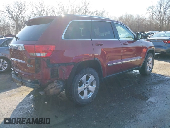 2012 Jeep Grand Cherokee Laredo with VIN 1C4RJFAG3CC163764, listed as a IAAI auction lot 41719137 with 198,827 mi miles. Bid and sale history available at carsss.com. Image 4.