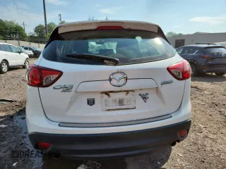 2016 Mazda CX-5 Sport with VIN JM3KE4BYXG0704194, listed as a Copart auction lot 62095735 with 93,970 mi miles and Salvage title. Bid and sale history available at DreamBid. Image 6.