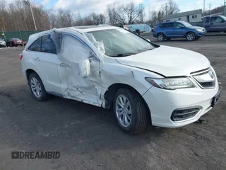 2017 Acura RDX w/Technology Pkg with VIN 5J8TB4H5XHL022338, listed as a IAAI auction lot 41323895 with 135,893 mi miles. Bid and sale history available at carsss.com. Image 1.