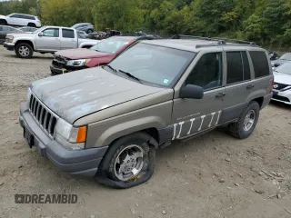 1996 Jeep Grand Cherokee Laredo with VIN 1J4GZ58S7TC403946, listed as a Copart auction lot 71785734 with 231,780 mi miles and Salvage Title. Bid and sale history available at carsss.com. Image 1.