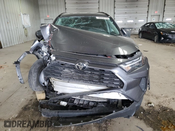 2023 Toyota RAV4 XLE with VIN 2T3P1RFV4PC330699, listed as a Copart auction lot 60452155 with 31,424 mi miles and Salvage title. Bid and sale history available at DreamBid. Image 5.