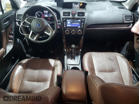 2017 Subaru Forester Touring with VIN JF2SJAWC7HH504086, listed as a Copart auction lot 44129835 with 104,970 mi miles and Salvage Title. Bid and sale history available at DreamBid. Image 8.