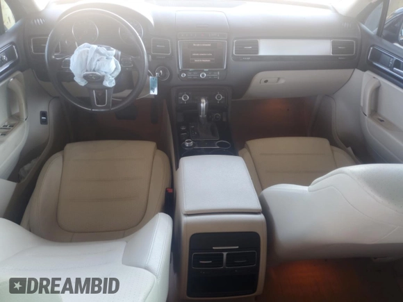 2017 Volkswagen Touareg Sport with VIN WVGEF7BP8HD000237, listed as a Copart auction lot 52714074 with 107,463 mi miles and . Bid and sale history available at DreamBid. Image 8.