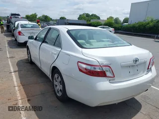 2009 Toyota Camry z VIN 4T1BB46K59U099788, wystawiony jako IAAI lot #42400201 z przebiegiem 306 266 mil mil oraz . Historia ofert i sprzedaży dostępna na DreamBid. Obrazek 3.