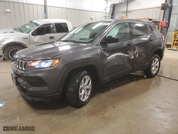 2024 Jeep Compass Sport with VIN 3C4NJDAN0RT170296, listed as a Copart auction lot 84898754 with 8,933 mi miles and Salvage Title. Bid and sale history available at carsss.com. Image 1.