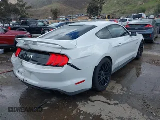 2018 Ford Mustang GT z VIN 1FA6P8CF5J5154590, wystawiony jako IAAI lot #41588857 z przebiegiem 113 805 mil mil oraz . Historia ofert i sprzedaży dostępna na DreamBid. Obrazek 4.