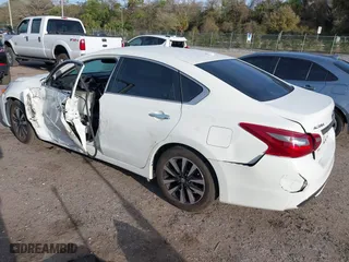 2018 Nissan Altima 2.5 SV with VIN 1N4AL3AP7JC235011, listed as a IAAI auction lot 41737494 with 76,330 mi miles. Bid and sale history available at carsss.com. Image 3.
