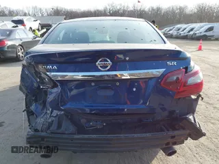 2018 Nissan Altima SR with VIN 1N4AL3AP1JC133204, listed as a IAAI auction lot 41780670 with 97,966 mi miles and . Bid and sale history available at DreamBid. Image 16.