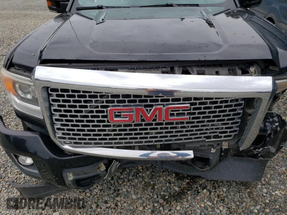2016 GMC Sierra 3500HD Denali z VIN 1GT42YE82GF140938, wystawiony jako Copart lot #52556095 z przebiegiem 136 654 mil mil oraz Szkoda całkowita • Salvage title. Historia ofert i sprzedaży dostępna na DreamBid. Obrazek 11.