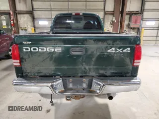 1999 Dodge Dakota SLT with VIN 1B7GG22Y9XS299933, listed as a Copart auction lot 82360644 with 146,506 mi miles and Clean Title. Bid and sale history available at DreamBid. Image 6.
