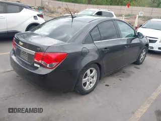 2014 Chevrolet Cruze 1LT with VIN 1G1PC5SB4E7134678, listed as a IAAI auction lot 42171165 with 125,225 mi miles and . Bid and sale history available at DreamBid. Image 4.