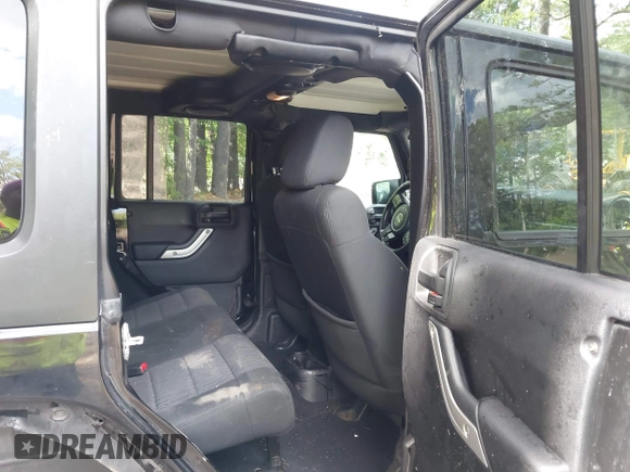 2012 Jeep Wrangler Unlimited Call of Duty MW3 with VIN 1C4BJWFG5CL103267, listed as a IAAI auction lot 42334345 with 135,324 mi miles and . Bid and sale history available at DreamBid. Image 8.