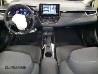 2021 Toyota Corolla Hybrid LE with VIN JTDEAMDE4MJ002382, listed as a Copart auction lot 50318865 with 74,385 mi miles and Salvage Title. Bid and sale history available at carsss.com. Image 8.
