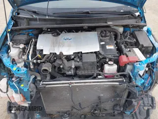 2021 Toyota Prius L Eco with VIN JTDKAMFU5M3145949, listed as a IAAI auction lot 42113123 with 127,872 mi miles and . Bid and sale history available at DreamBid. Image 10.