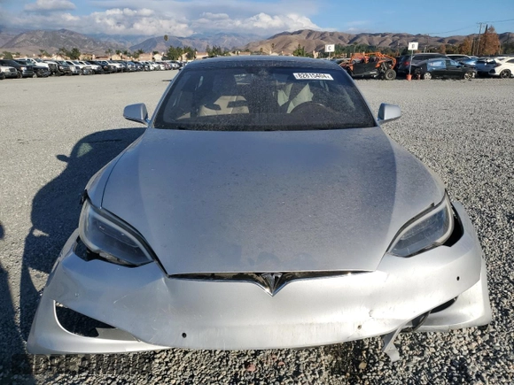 2016 Tesla Model S 90D with VIN 5YJSA1E26GF147974, listed as a Copart auction lot 82815404 with 126,609 mi miles and Salvage Title. Bid and sale history available at DreamBid. Image 5.