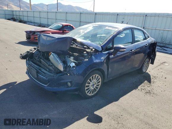 2016 Ford Fiesta Titanium z VIN 3FADP4CJ7GM157983, wystawiony jako Copart lot #75773954 z przebiegiem 149 363 mil mil oraz Szkoda całkowita • Salvage title. Historia ofert i sprzedaży dostępna na DreamBid. Obrazek 1.