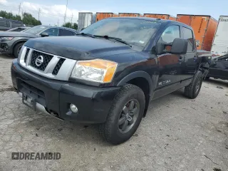 2015 Nissan Titan Pro-4X with VIN 1N6BA0EC1FN507894, listed as a Copart auction lot 65784274 with 147,576 mi miles and Salvage title. Bid and sale history available at DreamBid. Image 1.
