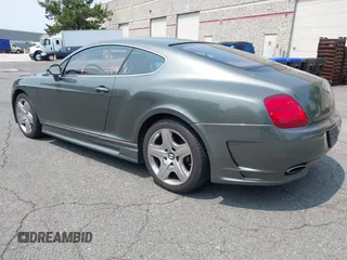 2005 Bentley Continental GT GT z VIN SCBCR63W45C024347, wystawiony jako IAAI lot #42425201 z przebiegiem 97 414 mil mil oraz . Historia ofert i sprzedaży dostępna na DreamBid. Obrazek 3.
