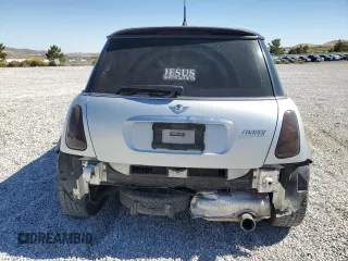 2002 MINI Hardtop with VIN WMWRC33472TC34281, listed as a Copart auction lot 71631644 with 196,947 mi miles and Salvage Title. Bid and sale history available at DreamBid. Image 6.