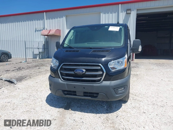 2020 Ford Transit Cargo z VIN 1FTYE1Y89LKB76753, wystawiony jako IAAI lot #42468252 z przebiegiem 53 193 mil mil oraz . Historia ofert i sprzedaży dostępna na DreamBid. Obrazek 12.