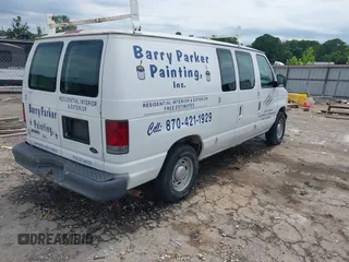 2006 Ford Econoline Cargo with VIN 1FTRE14W56HA74697, listed as a IAAI auction lot 42341374 with 153,519 mi miles and . Bid and sale history available at DreamBid. Image 4.