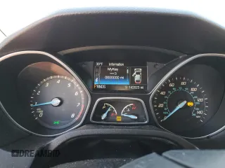 2014 Ford Focus Titanium z VIN 1FADP3N2XEL263357, wystawiony jako Copart lot #84610634 z przebiegiem 142 023 mil mil oraz Nie do naprawy • Non repairable. Historia ofert i sprzedaży dostępna na DreamBid. Obrazek 9.
