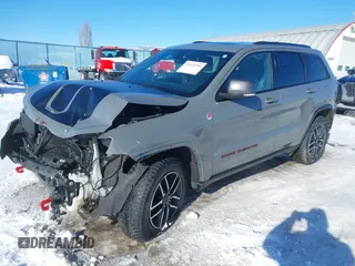 2021 Jeep Grand Cherokee Trailhawk with VIN 1C4RJFLG2MC854007, listed as a IAAI auction lot 41512394 with 50,674 mi miles. Bid and sale history available at carsss.com. Image 20.