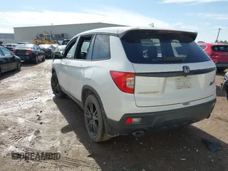 2021 Honda Passport Sport с VIN 5FNYF7H25MB000793, выставлен на аукционе IAAI как лот 41350844 с пробегом 54 958 миль миль и . История ставок и продаж доступна на DreamBid. Изображение 3.
