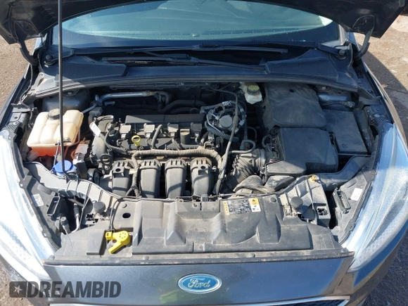 2017 Ford Focus SE z VIN 1FADP3F22HL235085, wystawiony jako IAAI lot #42465812 z przebiegiem 84 419 mil mil oraz . Historia ofert i sprzedaży dostępna na DreamBid. Obrazek 10.
