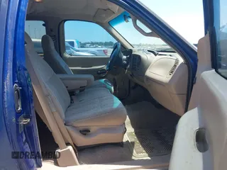 1998 Ford F-150 with VIN 1FTZX1725WKB57987, listed as a IAAI auction lot 42854030 with 210,471 mi miles and . Bid and sale history available at DreamBid. Image 5.