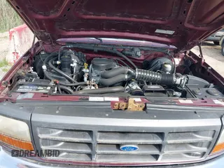 1996 Ford F-150 with VIN 1FTEX14N1TKA29223, listed as a IAAI auction lot 42584324 with 98,379 mi miles and . Bid and sale history available at DreamBid. Image 10.