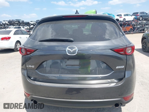 2017 Mazda CX-5 Grand Touring with VIN JM3KFADL3H0227655, listed as a IAAI auction lot 41897981 with 103,545 mi miles. Bid and sale history available at carsss.com. Image 16.