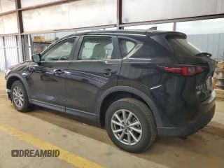 2023 Mazda CX-5 2.5 S with VIN JM3KFBAMXP0209820, listed as a Copart auction lot 43739645 with 9,653 mi miles and Salvage Title. Bid and sale history available at carsss.com. Image 2.