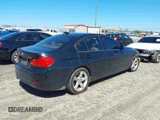 2014 BMW 3 Series 328i with VIN WBA3A5C55EP603035, listed as a IAAI auction lot 41771067 with 105,162 mi miles and . Bid and sale history available at carsss.com. Image 4.