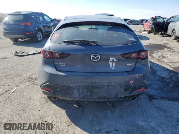 2023 Mazda 3 S Carbon Edition with VIN JM1BPBLM3P1616343, listed as a Copart auction lot 42303815 with 19,557 mi miles and Salvage title. Bid and sale history available at DreamBid. Image 6.