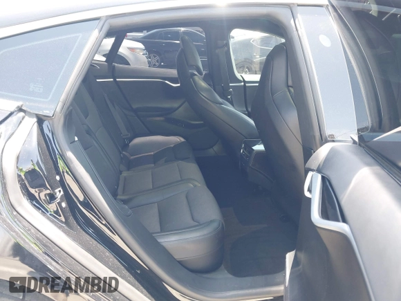 2017 Tesla Model S 60 with VIN 5YJSA1E17HF232699, listed as a IAAI auction lot 42327539 with 113,923 mi miles and . Bid and sale history available at DreamBid. Image 8.