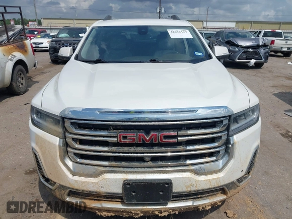 2021 GMC Acadia SLT with VIN 1GKKNMLS8MZ114591, listed as a IAAI auction lot 42052137 with 73,313 mi miles and . Bid and sale history available at DreamBid. Image 12.