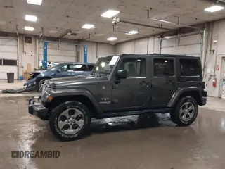 2016 Jeep Wrangler Unlimited Sahara с VIN 1C4BJWEG3GL172532, выставлен на аукционе IAAI как лот 42205994 с пробегом 93 672 миль миль и . История ставок и продаж доступна на DreamBid. Изображение 14.