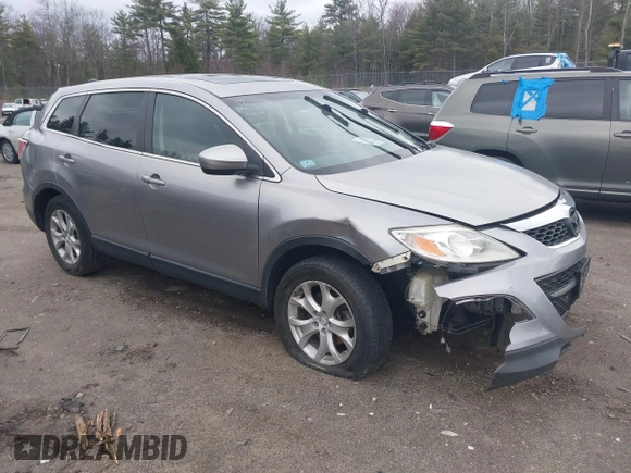 2011 Mazda CX-9 Touring z VIN JM3TB3CV7B0328316, wystawiony jako IAAI lot #42040999 z przebiegiem 160 421 mil mil oraz . Historia ofert i sprzedaży dostępna na DreamBid. Obrazek 1.